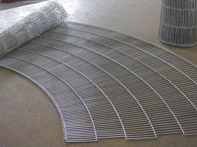 An opened and a closed flat flex conveyor belts on the ground.