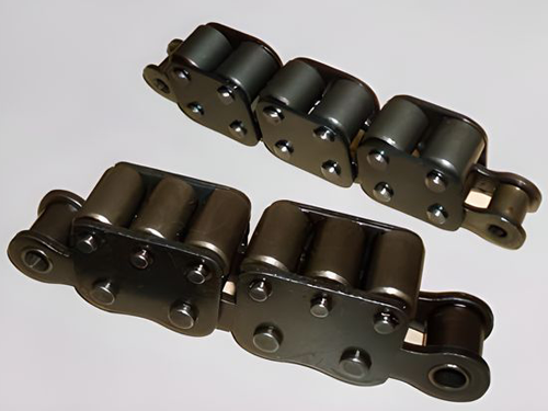 Two carbon steel chain links on the white background.