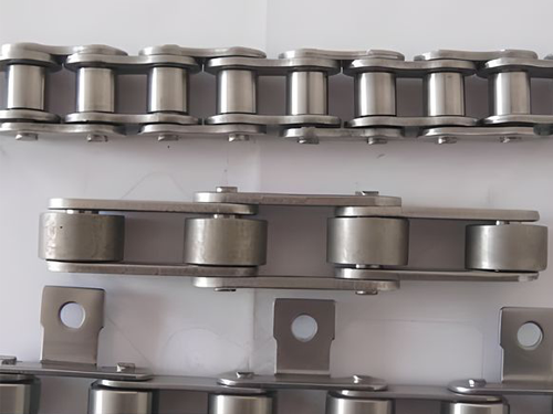 Three stainless steel chain links on the white background.