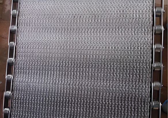A piece of compound weave conveyor belt with chain edge.