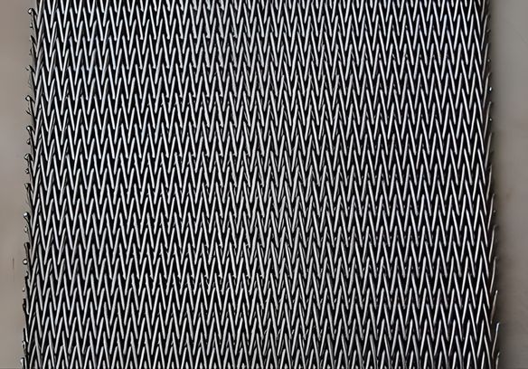 A piece of compound weave conveyor belt with welded edge.