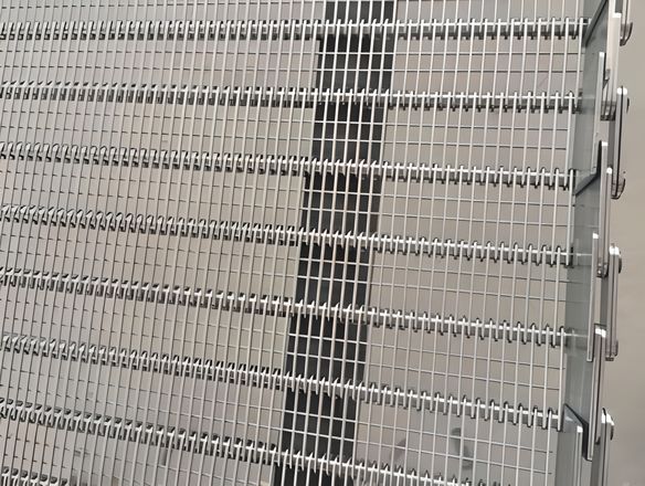 A standard eye link conveyor belt with side guard edge.