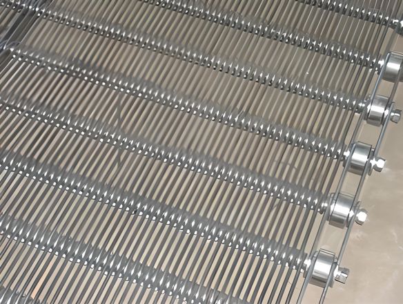 A standard eye link conveyor belt on the table.