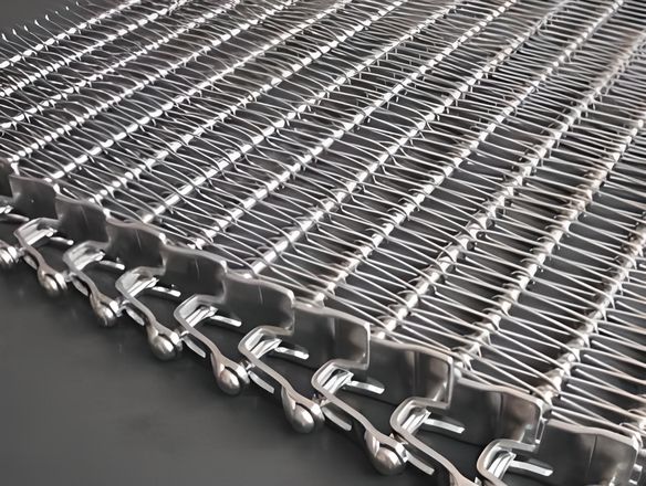 A flexible rod conveyor belt with side guards on the blue background.