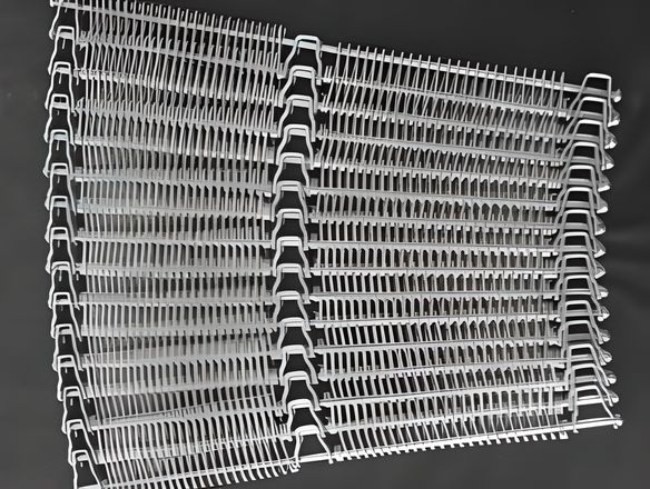 A curved flexible rod on the red background with U-shaped links on the both side and center of the belts.