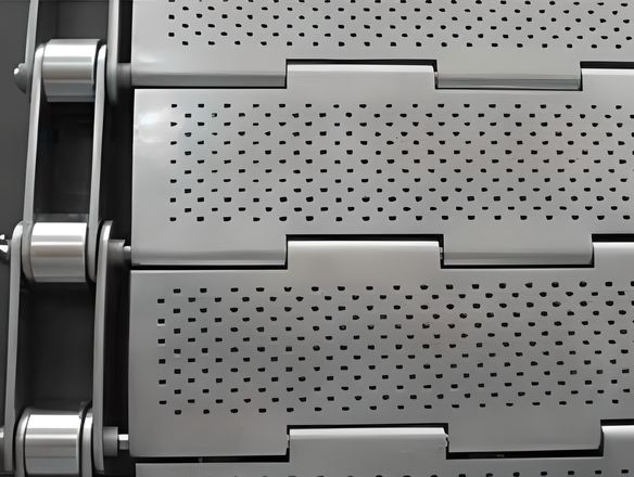 A perforated plate conveyor belt with chain link edges on the blue background.