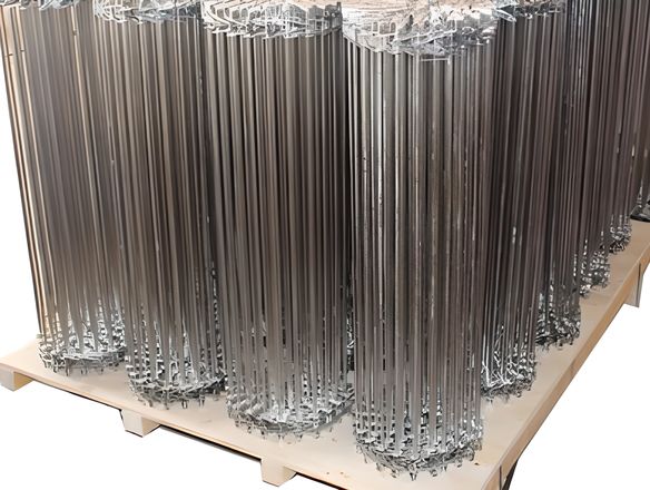 Several rolls of rod conveyor belt on the wooden pallet.