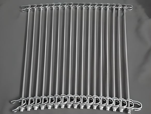 A standard rod conveyor belt with U-shaped link edge on the red background.