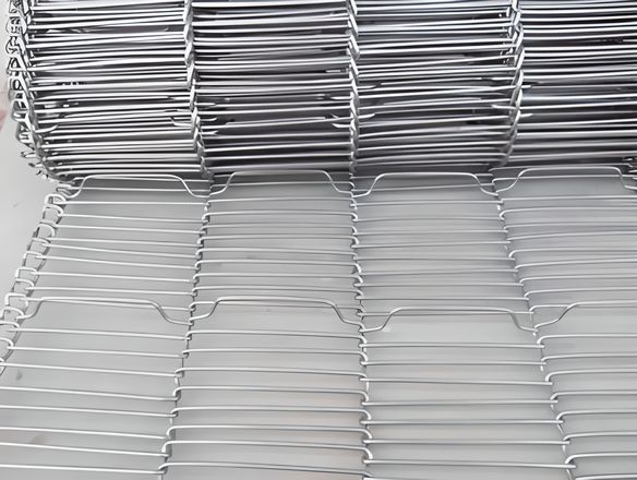 A roll of rod network conveyor belt with barrier on the belt.