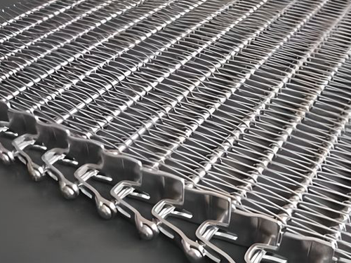 A flexible rod conveyor belt with U-shaped links and side guards.